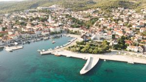 an aerial view of a town in a body of water at Hotel Osam - Adults Only in Supetar