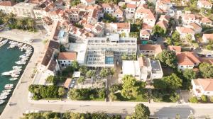 an aerial view of a city with white buildings at Hotel Osam - Adults Only in Supetar