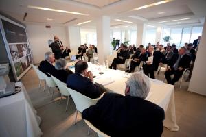 a group of people sitting around a table in a room at Villa Del Mare Spa Resort in Cervia +58 photos