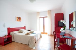 Voodi või voodid majutusasutuse Hotel Delle More toas