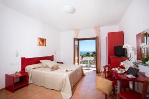 Voodi või voodid majutusasutuse Hotel Delle More toas