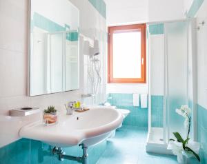 Vannituba majutusasutuses Hotel Delle More