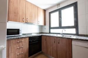 Η κουζίνα ή μικρή κουζίνα στο Outdoor Apartaments - Comfort
