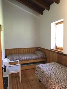 A bed or beds in a room at CAL RAMUNDAINA