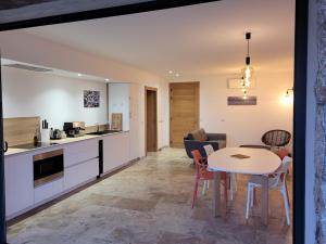 A kitchen or kitchenette at ARGIALE - ARGHJALE