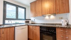 Η κουζίνα ή μικρή κουζίνα στο Outdoor Apartaments - Comfort