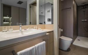 Salle de bains dans l'établissement Grums Hotel & Spa