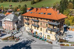 an overhead view of a building with an orange roof at Hirschenhof in Spital am Semmering