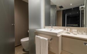 Salle de bains dans l'établissement Grums Hotel & Spa