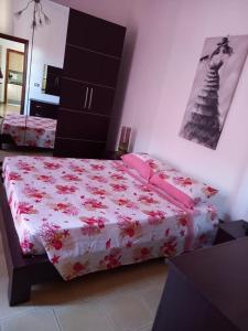 Ein Bett oder Betten in einem Zimmer der Unterkunft Casa Vacanze Principe Amedeo