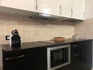 Kuchyňa alebo kuchynka v ubytovaní Residenza Pedrotti
