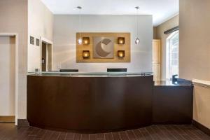 a large lobby with a reception desk in a building at Comfort Inn & Suites in Villa Rica