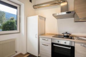 Kuchyňa alebo kuchynka v ubytovaní Apt Hofer Sandra + 22 fotografií