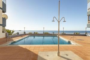 Bazén v ubytovaní Apartment sea-front alebo v jeho blízkosti