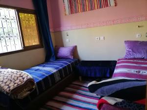 Giường trong phòng chung tại Gîte Tamsoulte