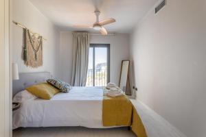 A bed or beds in a room at La Reserva