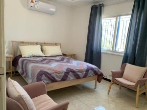 מיטה או מיטות בחדר ב-Gedara Guesthouse: enjoy unforgettable scenes
