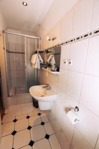 Ванная комната в Hotel Restaurant Zagreb