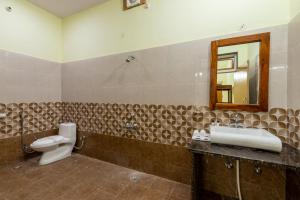 Koupelna v ubytování Jungle Cave Resort + 45 fotografií