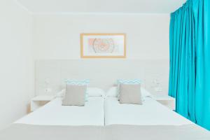 Postel nebo postele na pokoji v ubytování Gloria Izaro Club Hotel + 37 fotografií