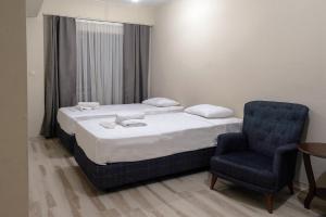 Een bed of bedden in een kamer bij Siba Pamukkale Life
