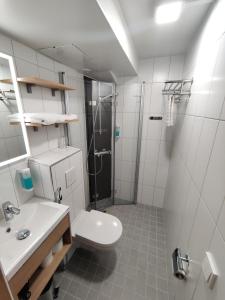 Ванная комната в Hotelli Toivola