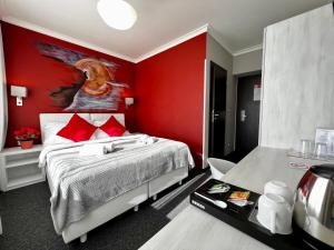 Säng eller sängar i ett rum på Hotel Shato Gesson