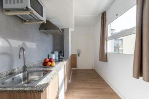 Küche/Küchenzeile in der Unterkunft Apartamentos Venecia