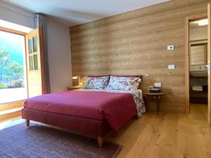 Ένα ή περισσότερα κρεβάτια σε δωμάτιο στο B & B Chalet Plan
