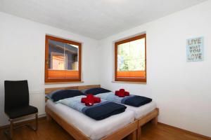 Posteľ alebo postele v izbe v ubytovaní Ferienhaus Jäger + 14 fotografií