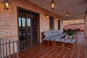 Posedenie v ubytovaní Villa El Rosal del Pozo