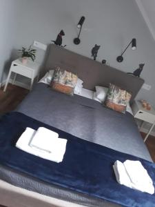 Posteľ alebo postele v izbe v ubytovaní Apartamenty Koci Ogon