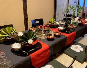 a set of tables with plants on top of them at Kikunoya - Vacation STAY 83152 in Nagoya
