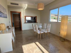 A seating area at Amazing duplex with large terrace and sea views