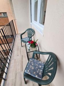 A balcony or terrace at Apartman Petrov