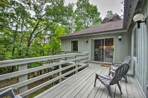 two chairs on a deck with a house at Vintage Massanutten Resort Villa with Deck! in McGaheysville