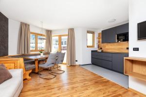 Telewizja i/lub zestaw kina domowego w obiekcie Residence Catarina Lanz