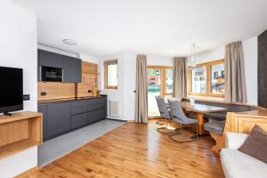 Telewizja i/lub zestaw kina domowego w obiekcie Residence Catarina Lanz