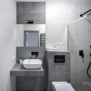 Kúpeľňa v ubytovaní Apartamenty Zielona Lipka