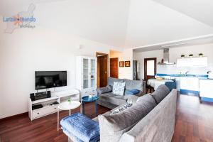 Telewizja i/lub zestaw kina domowego w obiekcie Vivienda Vacacional Del Mar