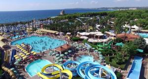 an aerial view of a resort with two pools at Attico Margherita - LA TERRAZZA SUL MARE in Gallipoli