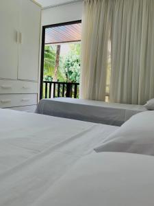 Cama o camas de una habitación en Flats no Nannai Residence - Muro Alto - Porto de Galinhas - Brasil