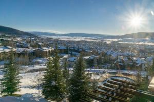 a view of a city in the snow at Edgemont 2306 - Luxury Condo - True Ski-in Ski-out Access & Winter Shuttle! in Steamboat Springs