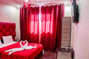 Voodi või voodid majutusasutuse HOTEL BORJ EL ARAB toas