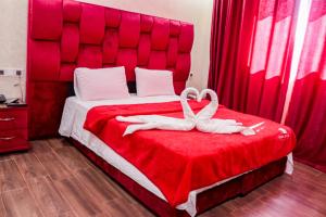 Voodi või voodid majutusasutuse HOTEL BORJ EL ARAB toas