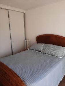 Een bed of bedden in een kamer bij Apart 14 de Julio