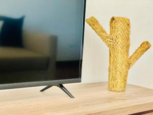 A television and/or entertainment centre at Canaryislandshost l Sea View