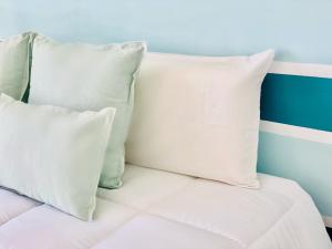 A bed or beds in a room at Canaryislandshost l Sea View