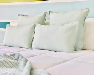 A bed or beds in a room at Canaryislandshost l Sea View
