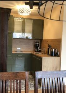 Kuchyň nebo kuchyňský kout v ubytování FeWo Talblick + 5 fotografií